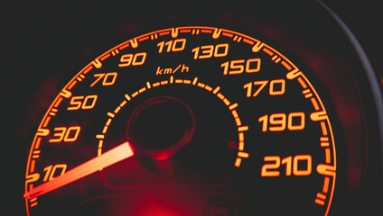 Driver's cockpit ; speedometer on dashboard - colorful light in black, copy space for your abstract...