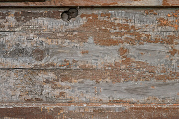 Old wooden planks with peeling paint. Texture for design