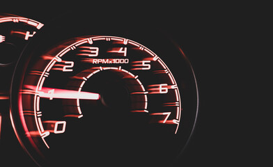 Driver's cockpit ; speedometer on dashboard - colorful light in black, copy space for your abstract...
