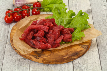 Raw beef meat sliced for cooking