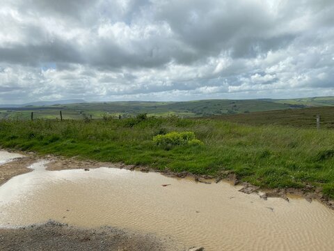 View over the hills, near the Atom Trail, with heavy rain clouds near, Wycoller, Colne, Lancashire, UK