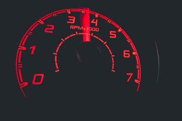 Driver's cockpit ; speedometer on dashboard - colorful light in black, copy space for your abstract...