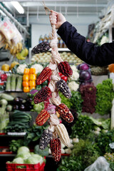 hand holding colorful choclos