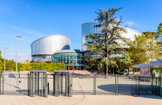 Strasbourg, France - September 13, 2019: The access to the building of the European Court of Human Rights, built in 1995 after architect Richard Rogers, is secured by a fence and security turnstiles.