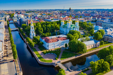 Obraz premium Panorama of Saint Petersburg in summer. Shooting of St. Petersburg from the air. Russia. St. Nicholas Naval Cathedral from a height. View of the center of Petersburg on a summer day. Trip to Russia.