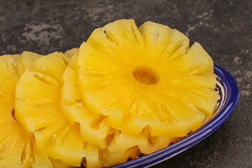 Marinated pineapple rings in the bowl