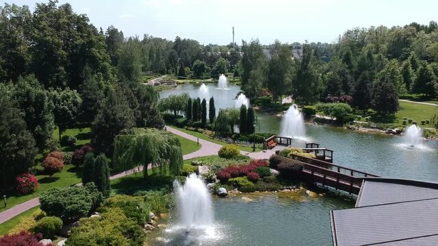 Aerial view, Mezhyhirya residence of the former president of Ukraine Viktor Yanukovych. Beautiful lakes with fountains. Drone