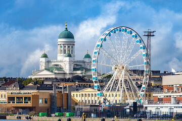 Helsinki. Finland. Sights of the capital of Finland. The Ferris wheel in the Harbor of Helsinki. The sky wheel. Suurkirkko. Cathedral Of St. Nicholas The Wonderworker. Travel to Scandinavia.
