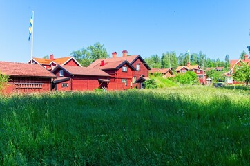 A sunny summer morning around lake Siljan with forests and rolling hills in beautiful Dalarna,Sweden