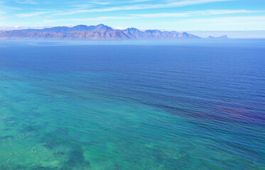 Cape Town, Western Cape / South Africa - 04/26/2019: Aerial photo of Macassar Beach with Hangklip in the background