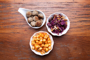 Nutrition concept - Healthy meals in white bowls over wooden background. Healthy food, Diet, Detox, Clean Eating or Vegetarian concept. Top view sets.