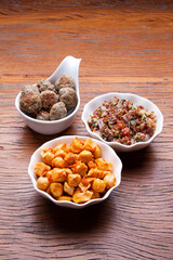 Nutrition concept - Healthy meals in white bowls over wooden background. Healthy food, Diet, Detox, Clean Eating or Vegetarian concept. Top view sets.