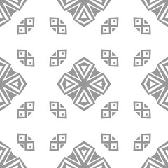 Seamless monochromatic decorative pattern. Grey and white geometric tiling background