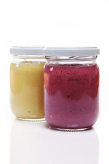 Nutrition concept - Healthy meals in glass jars over white background. Healthy take-away lunch jar. 