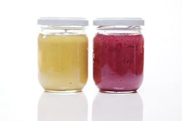 Nutrition concept - Healthy meals in glass jars over white background. Healthy take-away lunch jar. 