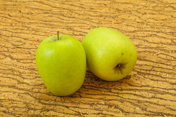 Two ripe green sweet apples
