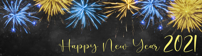 HAPPY NEW YEAR 2021 - Silvester background banner panorama long- Colorful blue yellow firework on...