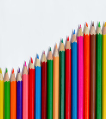 wave with colored pencils, school supplies