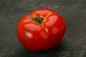 Ripe big juicy red tomato