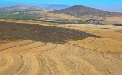 Cape Town, Western Cape / South Africa - 11/06/2017: Aerial photo of agricultural fields with Table Mountain in the background