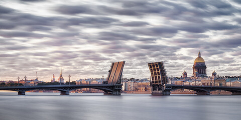 Fototapeta na wymiar Neva river in Saint Petersburg panoramic view with divorced bridge at white nights
