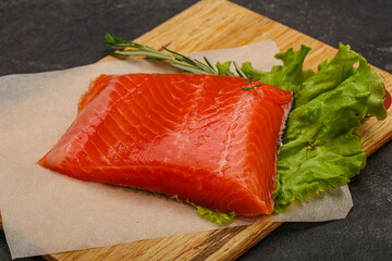 Salmon piece steak served rosemary