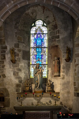  Stained glass in Saint Pierre parish church. Mont Saint Michel, France