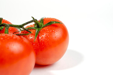 Fresh red tomatoes isolated on white background
