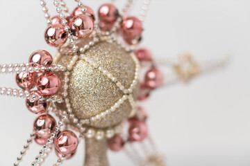 silver-gold Christmas ornament with corals