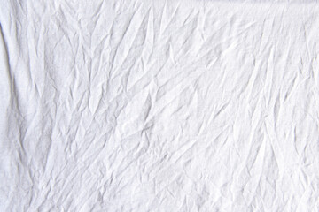 Naklejka na ściany i meble Wrinkled crumpled white cloth, background or texture