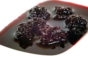 Close up view of a blackberry jam in the plate
