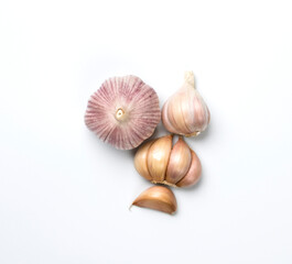 Fresh clean garlic heads and cloves isolated on white backgound.