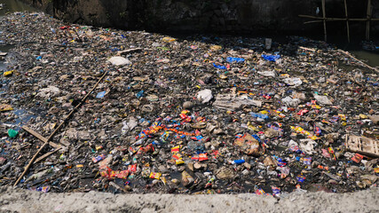 Dirty river in Dharavi slums. Mumbai. India.