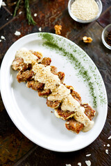 Veal medallions with nut sauce