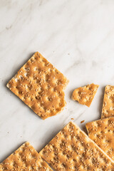 Knackebrot. Wholegrain crispbread with sesame seeds.