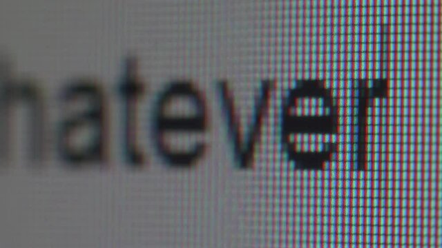 Typing word whatever several times. Close up view.