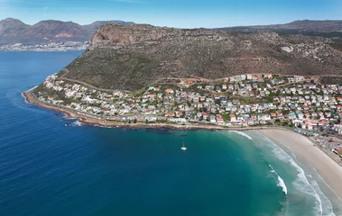 Deurstickers Cape Town, Western Cape / South Africa - 08/06/2011: Aerial photo of yacht at Fish Hoek Beach with Simonstown in the background © Grant Duncan-Smith
