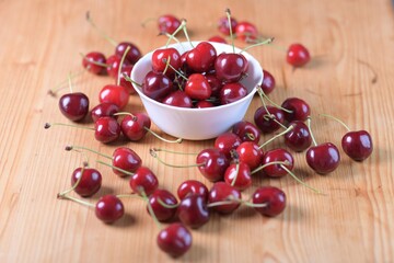 Red Cherries. pile of ripe cherries with stalks.