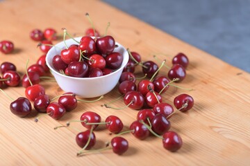 Red Cherries. pile of ripe cherries with stalks.