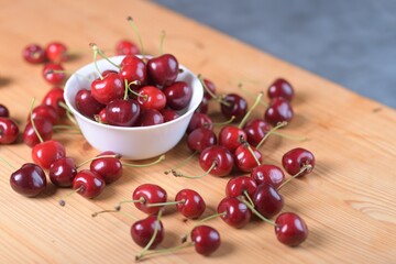 Red Cherries. pile of ripe cherries with stalks.