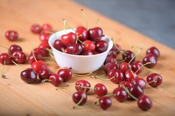 Red Cherries. pile of ripe cherries with stalks.