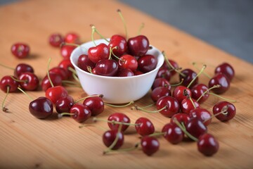 Red Cherries. pile of ripe cherries with stalks.