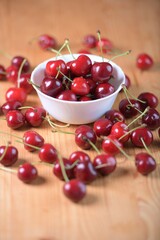 Red Cherries. pile of ripe cherries with stalks.