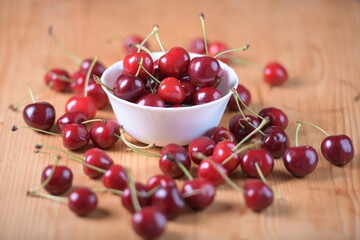 Red Cherries. pile of ripe cherries with stalks.