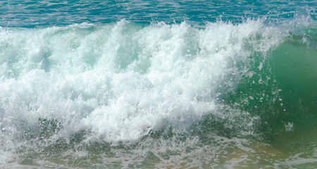 beautiful view of the beach coast of the Atlantic ocean in Portugal. Tourism and recreation. Waves break on the shore, banner.