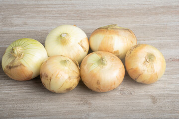 Obraz premium Authentic White Sweet Southern Onions On A White Panel Board