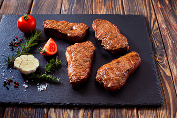 Stylishly presented of pieces steak in the restaurant
