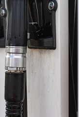 Filling guns. Filling gun. Filling columns with guns at a gas station.