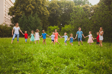 Obraz premium The concept of teambuilding for teacher and kids