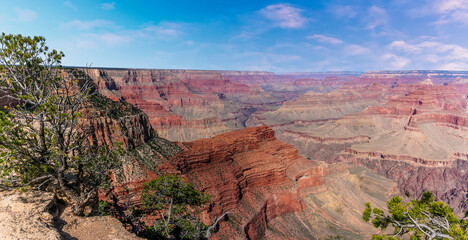 A glimpse of the Colorado River between the colored strata of the Grand Canyon from Hopi Point on...